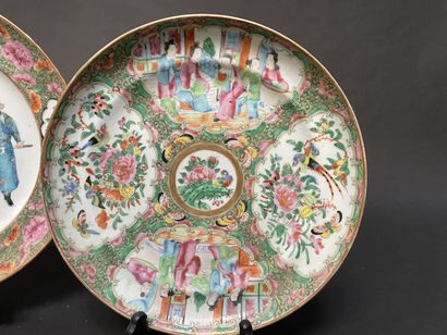 null Two Canton porcelain plates decorated with characters.

China, late 19th, early...