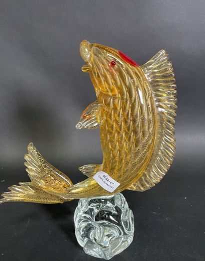 null Fish sculpture in yellow and red glass on round base in colorless glass signed...