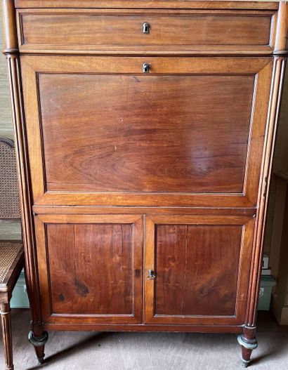 null Mahogany desk with flap, fluted uprights, toupie feet, white marble top.

Late...