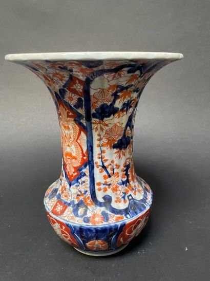 null Porcelain baluster vase with a flared neck and imari flower decoration.

Japan,...