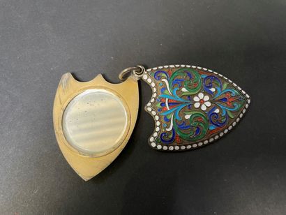 null Silver plated metal pendant, in the shape of a shield, one side decorated with...