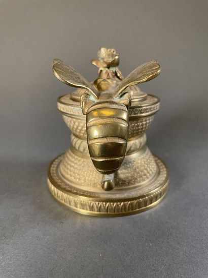null Round inkwell in chased bronze, the handle in the shape of a dragonfly, the...