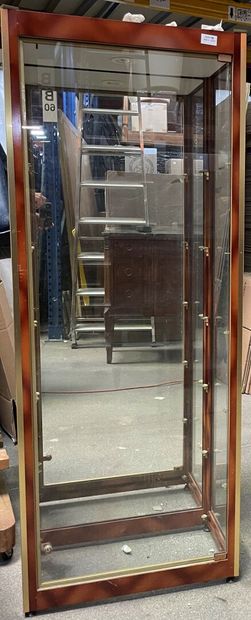 null Quadrangular display case in shaded brown lacquered metal, glass shelves.

Contemporary...