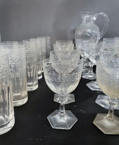 null Service of crystal stemmed glasses engraved with a frieze of water leaves including...