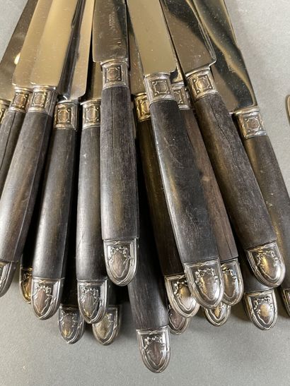 null Set of forks and fruit knives in gilded metal and resin

and a set of large...