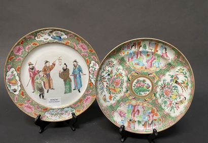 null Two Canton porcelain plates decorated with characters.

China, late 19th, early...