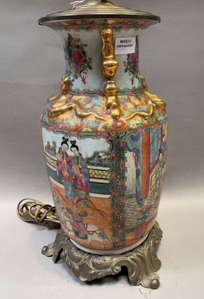 null A Canton porcelain baluster vase with polychrome enamelled courtesans mounted...