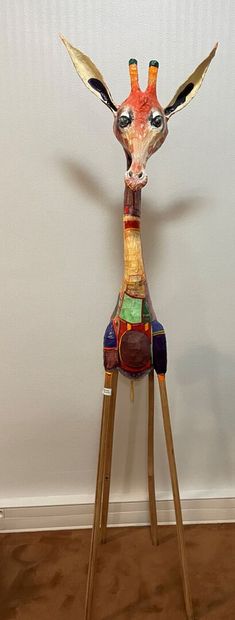 null Sculpture formant girafe en papier mâché

Signée BOULIET

H : 185 cm