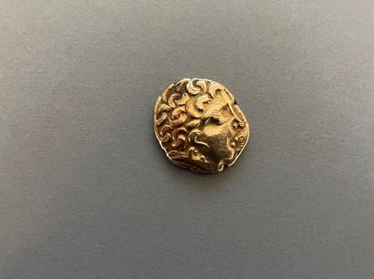 null Carnutes. Gold statere with inverted lyre, class III with luniform profile (7,48...