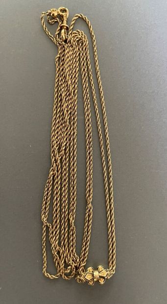 null Long watch chain in yellow gold twisted with its runner decorated with black...
