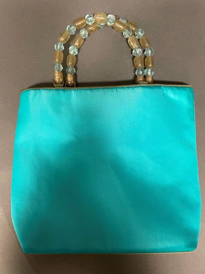 null Christian DIOR
Small turquoise nylon and khaki varnish bag, double beaded handle,...