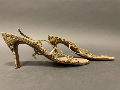 null Christian DIOR
Lot including a pair of sandals in green reptile, 
a pair of...