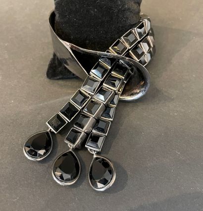 null Thierry MUGLER
Brushed metal "ribbon" bracelet, made of three rows of black...
