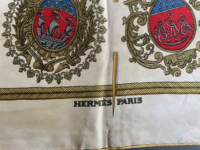 null HERMÈS Paris made in France 
Silk square titled "Les Armes de Paris" with cream...
