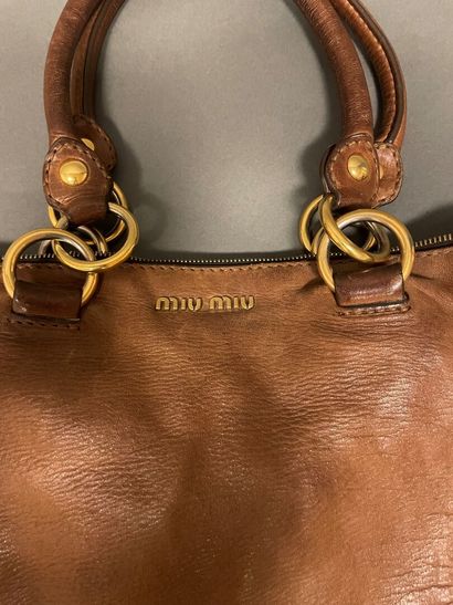 null MIU-MIU
Camel grained leather bag with gold studs, double handle, 
Wear, dirt,...