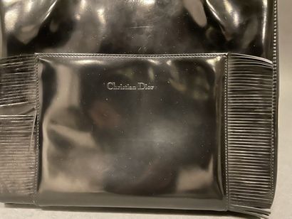 null Christian DIOR 
Small black glossy leather bag, double handle, zipper closure,...