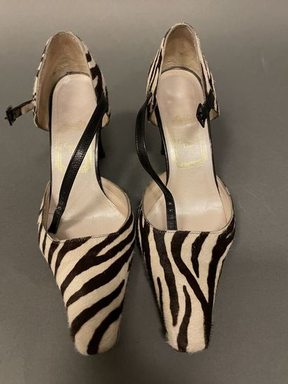 null Christian DIOR
Lot of three pairs of pumps including a pair of zebra style foal,...