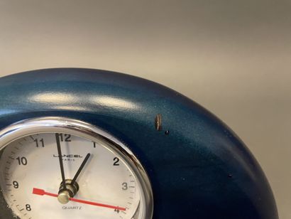null LANCEL
Wooden clock tinted navy blue in the form of a semicircle, with quartz.

Small...