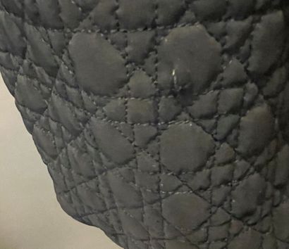 null Christian DIOR Boutique
Black quilted down jacket, small velvet pig collar,...