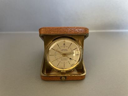 LANCEL
Travel alarm clock in gilded metal,...