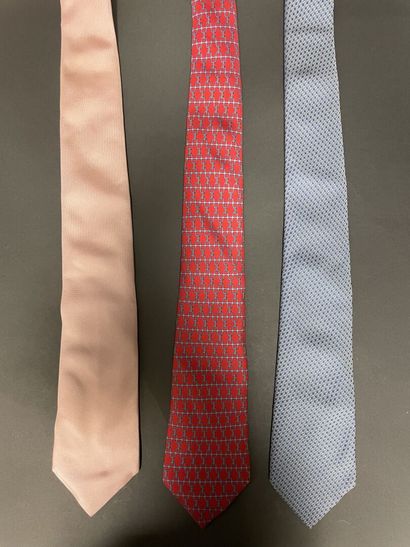null HERMÈS Paris, Alain FIGARET
Three silk ties, one with patterns on a red background,...