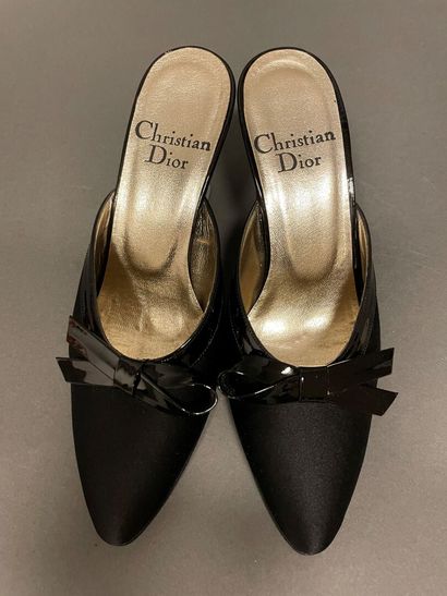 null Christian DIOR
Pair of black satin mules embellished with a black patent leather...
