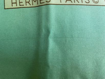 null HERMÈS Paris made in France 
Silk square titled "Coccinelles" on a soft green...