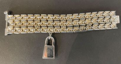 null Thierry MUGLER
Metal bracelet with three rows of rhinestones cut into squares,...