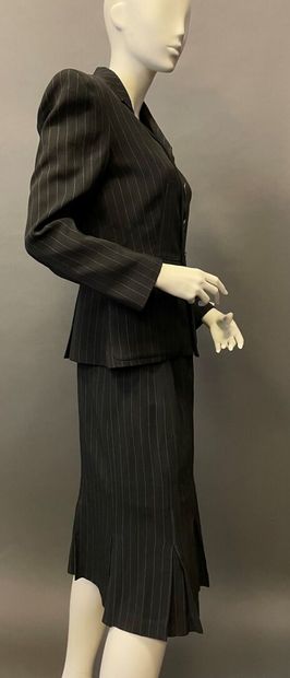 null Jean-Paul GAULTIER Classic number 10
Black wool suit with white tennis stripes,...