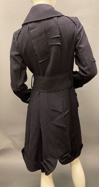 null Christian DIOR Boutique
Black wool coat with notched finish, notched collar,...