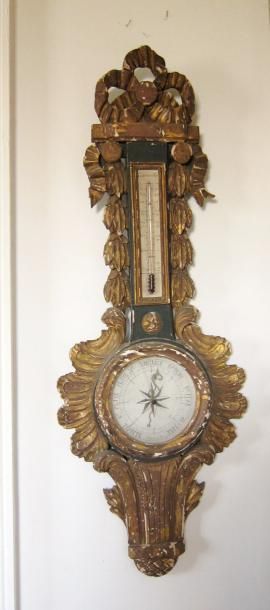 null Baromètre-thermomètre en bois laqué sculpté. Fin du XVIIIème siècle, début du...
