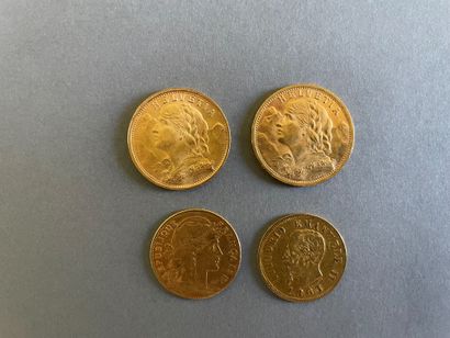 null *Lot de quatre pièces en or :
-Deux pièces de vingt francs suisse 1900 et1935,...