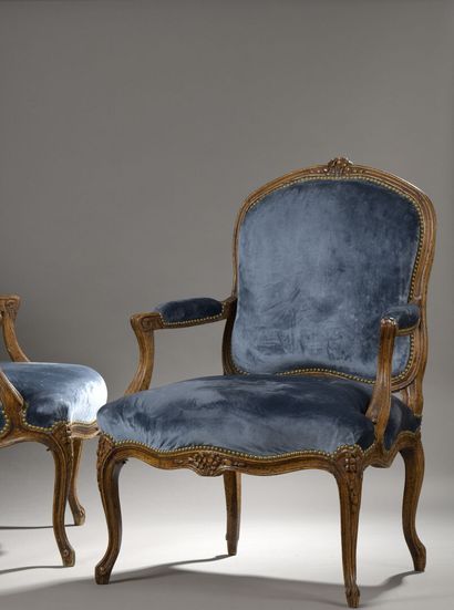 Pair of armchairs in molded natural wood...