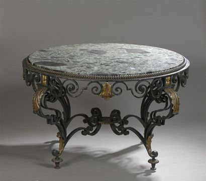null Louis KATONA (attributed to)
Wrought-iron coffee table with green patina and...