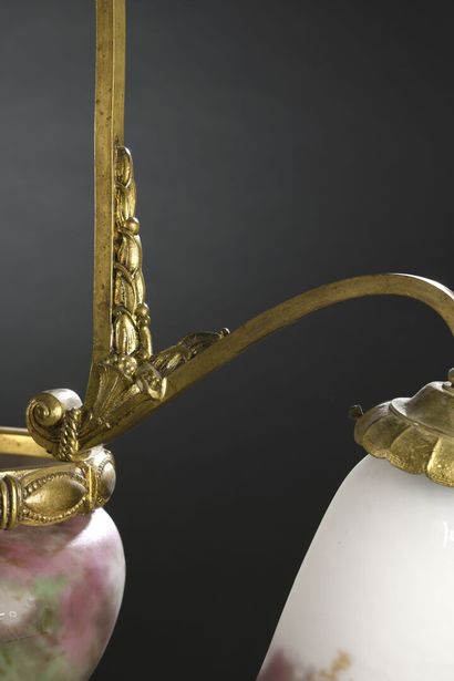 null MULLER FRERES - LUNEVILLE 
Bronze and gilded metal chandelier with three tulip-shaped...