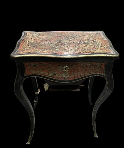 null Book table in blackened pearwood and red tortoiseshell veneer inlaid with brass...