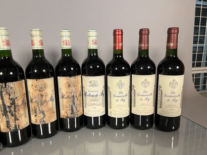 null 24 bottles including :

- 5 Château ROLLAN de BY Médoc 2000, 4 base bottles,...