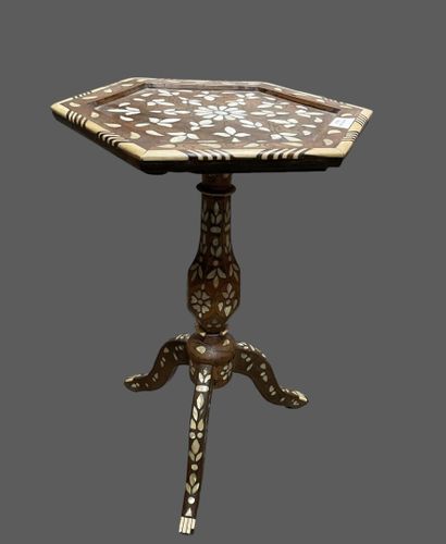 null Two small tables: one round with three legs in mother-of-pearl marquetry, and...
