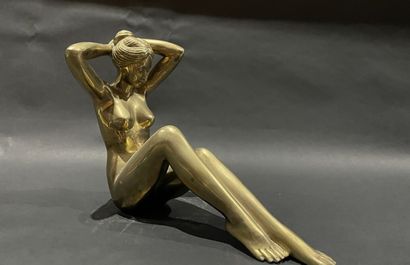 null Modern school 
Seated nude tying her hair
Gilt bronze proof. 
Circa 1970.
Some...