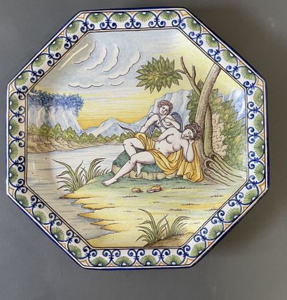 null NEVERS. Antoine MONTAGNON. 
Glazed earthenware dish decorated with a love figure...