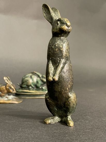 null Lot comprising two hares and two rabbits in patinated bronze, one in the taste...