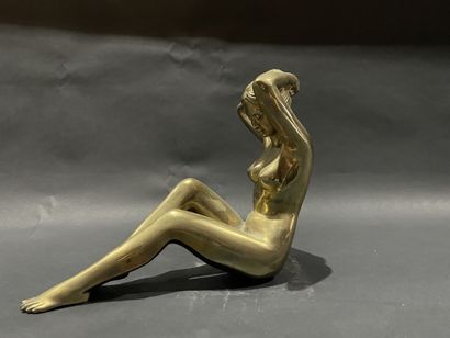 null Modern school 
Seated nude tying her hair
Gilt bronze proof. 
Circa 1970.
Some...