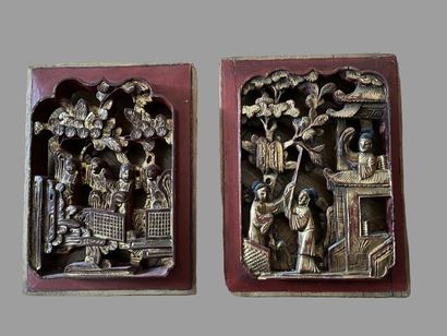 null Set of red lacquered gilded wood elements decorated with figures in high relief...