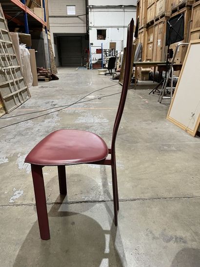 null Suite of six CATTELAN ITALIA chairs
with high narrow backs upholstered in burgundy...