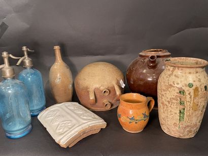 null Lot of seven ceramics and a glass pitcher.