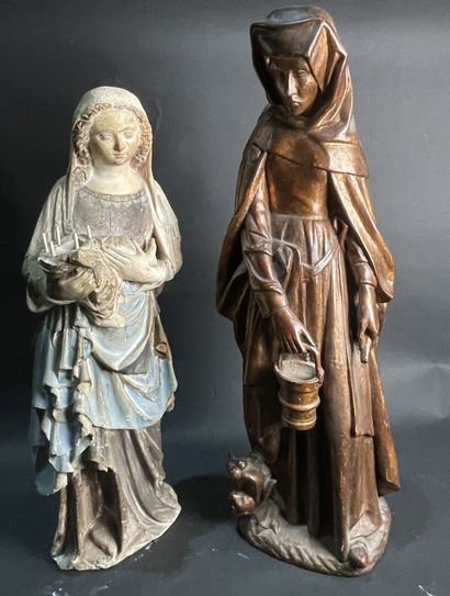 null Two sculptures in painted plaster or gilded wood representing women in the Gothic...