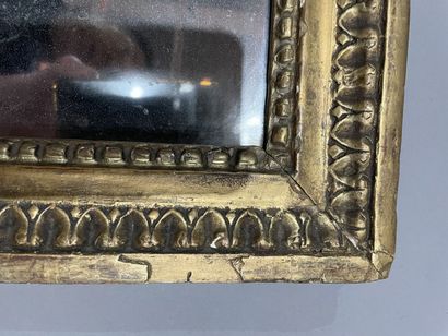 null Rectangular wood and gilded stucco mirror decorated with pearl and laurel leaf...