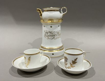 null Teapot and two litron cups and their saucers in gilded porcelain.
One chip