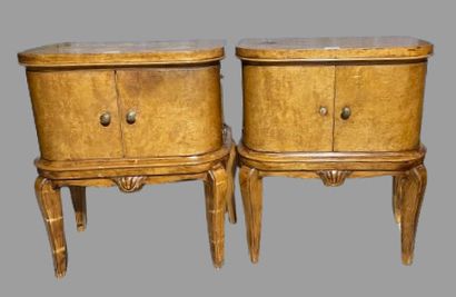 null Pair of bedside tables in light wood veneer, opening with two doors, one of...