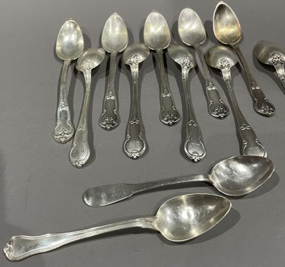null Ten small silver spoons chased with an arabesque design and figured
In their...